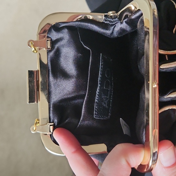 Black and gold Aldo Wristlet - Picture 3 of 3